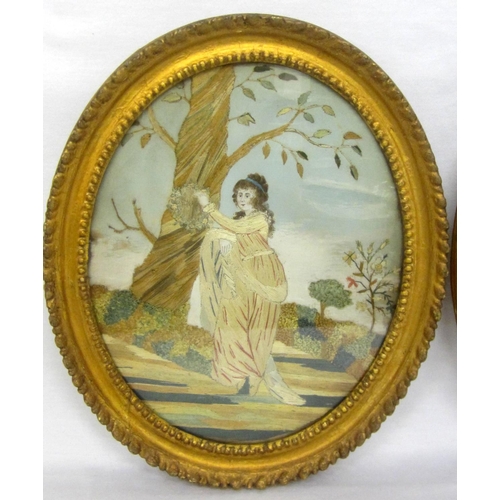 292 - Pair Gilt Framed Oval Embroidered Panels: young lady sitting with dog by a tree & young lady holding... 