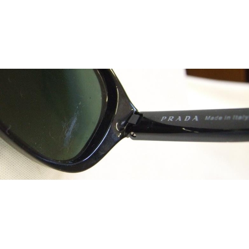 522 - Pair Mens Prada Linea Rosa Sunglasses, marked to frame SPS 01R 1AB-301 (have a scratch to inside of ... 