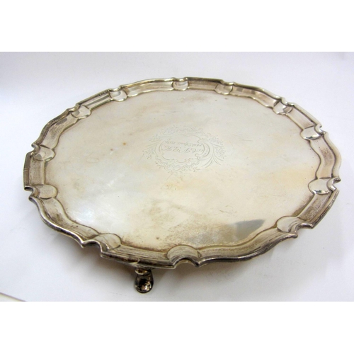 266 - Circular Silver Salver with Chippendale border, on 3 hoofed supports, London 1893 with later engravi... 