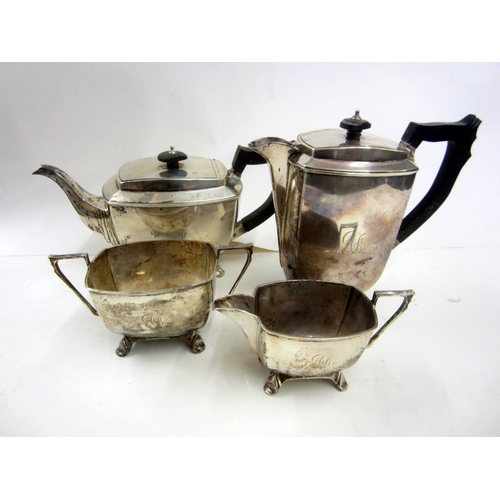 267 - Silver 4 Piece Tea Service: teapot, hot water jug, sugar & milk on lappet supports, engraved initial... 