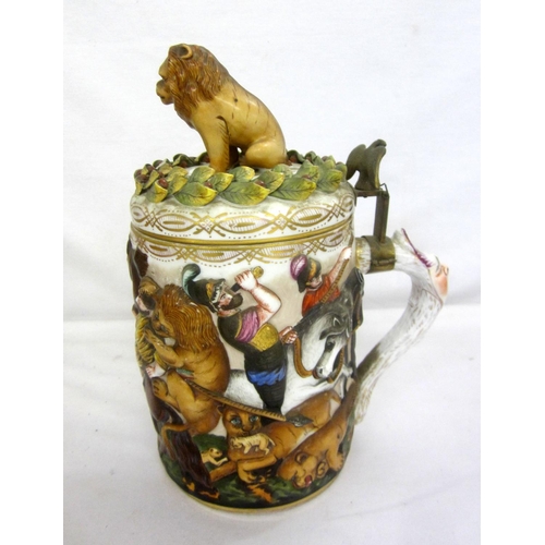 307 - C19th Naples Porcelain Tankard with deep relief body depicting lion hunt with mounted horses, top su... 