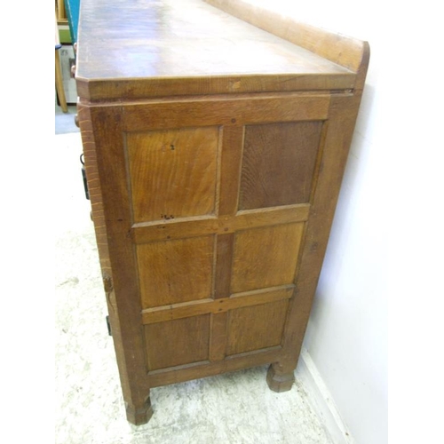 11 - The Mouseman Robert Thompson Oak Dining Room Suite: Refectory Table with facet carved supports, flat... 