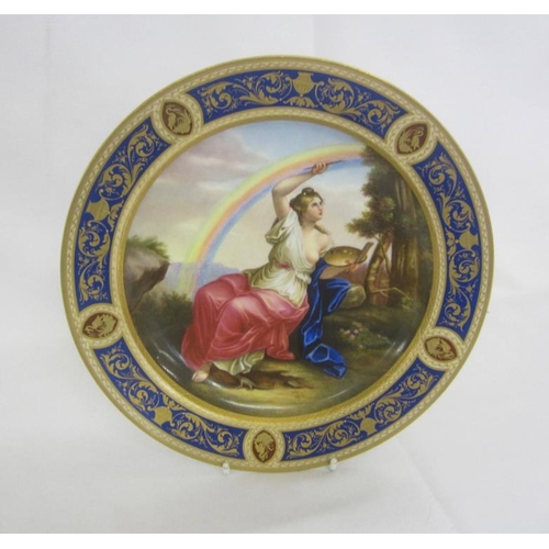 336 - C19th Vienna Dished Plate with hand painted scene of partially clad female painting a rainbow, blue ... 