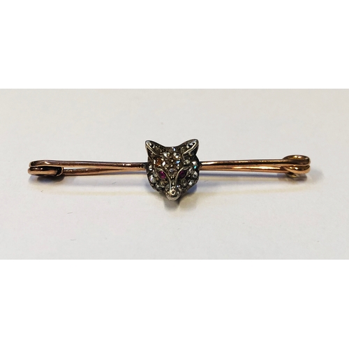 244 - Rose Gold Brooch set white metal fox head with ruby eyes & rose cut diamonds, approx. 5cm L