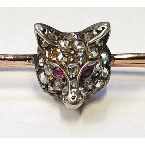 244 - Rose Gold Brooch set white metal fox head with ruby eyes & rose cut diamonds, approx. 5cm L