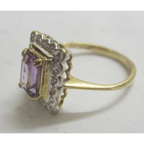 344 - Amethyst & Diamond Ring set 9ct. Gold with rectangular amethyst surrounded by diamonds, size J 1/2