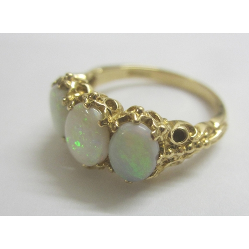 345 - Opal Trilogy/3 Stone Ring set 9ct. Gold size O