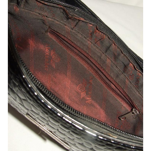 Black Leather Handbag marked 'Gucci', lining printed with 'Alexander',  labelled 'made in China & Sma