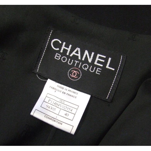 78 - Ladies Chanel Boutique Black Wool Crepe Jacket with 95% silk lining, labelled size 40