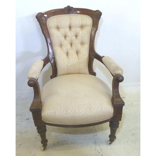 85 - Gents Victorian Walnut Open Armchair on turned front supports with brass & ceramic castors, upholste... 