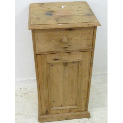 88 - Stripped Pine Bedside Cupboard on plinth base with frieze drawer (requiring some restoration) (A11)