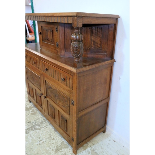 30 - Reproduction Oak Duodarn, lower section with 2 linenfold half panelled doors, 2 scoop carved drawers... 