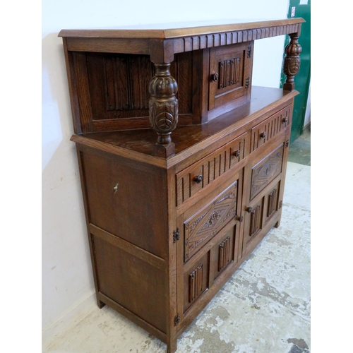 30 - Reproduction Oak Duodarn, lower section with 2 linenfold half panelled doors, 2 scoop carved drawers... 