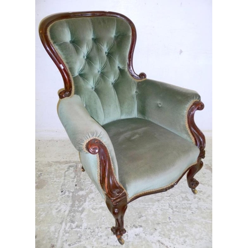 41 - Gentlemans Victorian Armchair on cabriole front supports, with castors, deep buttoned upholstered fa... 