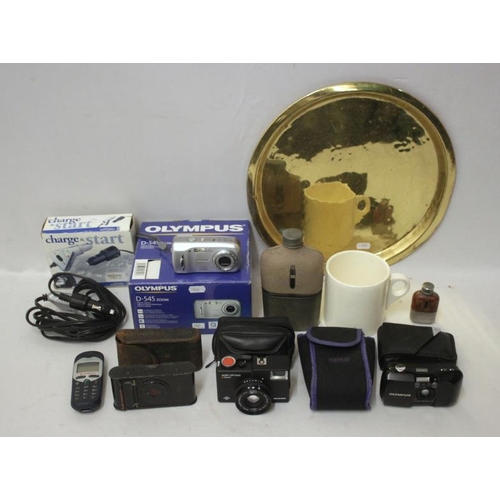 Semens Vodaphone Mobile Phone, hip flasks, Olympus camera, charge