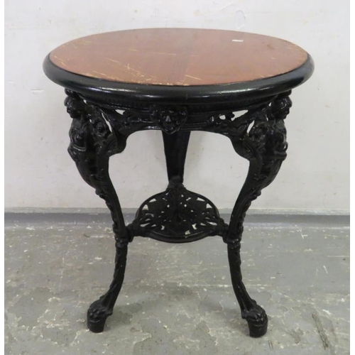 118A - Circular Wood Topped Cast Metal Pub Table with monopedia figural paw footed supports, small metal un... 