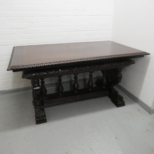 123 - Heavy Carved Oak Trestle Style Dining/Library Table approx. 170cm L x 101cm W, base carved with eagl... 