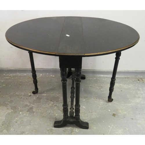 31 - Drop Flap Ebonised Side Table on turned supports approx. 62cm L, Sutherland style with 16cm central ... 