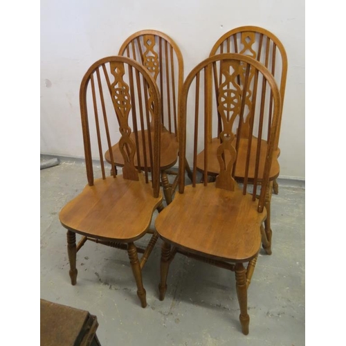 77 - Set of Malaysian Wheel Back chairs on turned front supports, 6 side + 2 carver (8) (A6/7)