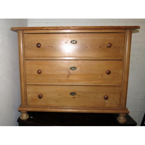 1 - Pine 3 Drawer Chest of Drawers, turned bun handles approx. 97cm W x 52cm D x 80cm H (A14)