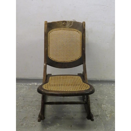 60 - Folding Bergere Rocking Chair with carved rose motif (FWR)