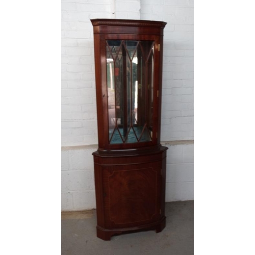 39 - Reproduction Bow Fronted Standing Mahogany Corner Cabinet on bracket supports with mirrored interior... 