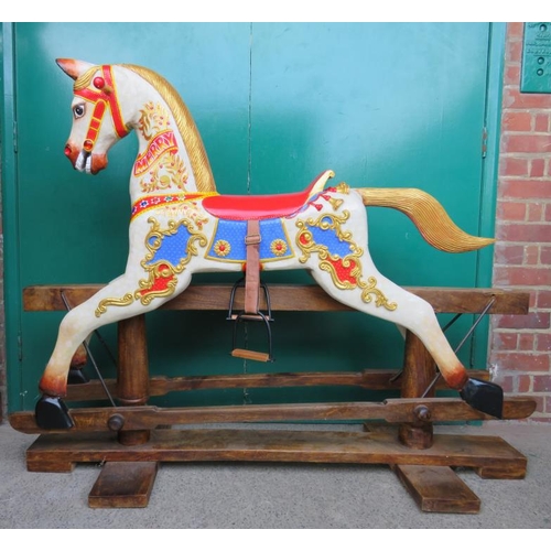 4 - Rocking Horse on Wooden Base painted to look like a carousel named Merry approx. 148cm L x 118cm H