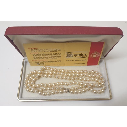 49 - Long Majorcan Cultured Pearl Necklace, double knotted with sterling silver clasp, total length 1.2m