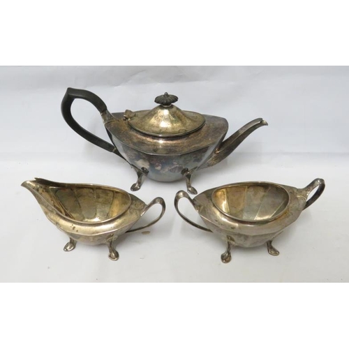 650 - Silver Three Piece Tea Set faceted Body on 4 hoof supports with composition handle, Sugar bowl and m... 