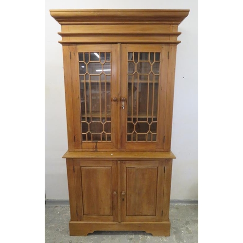 51 - 2 Door Pine Bookcase Cabinet under cornice W:110xD:49xH:93cm
Top W:120xD:35x130cm, Overall Height: 2... 