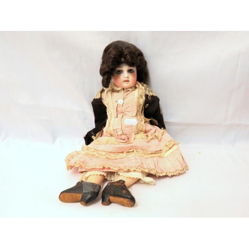1389 - Jumeau Bisque Headed Doll with blue eyes, brown wig in ringlets wearing brown jacket & lace trimmed ... 