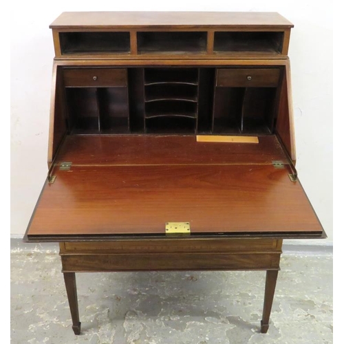 42 - Inlaid Mahogany Bureau Fall containing well fitted nest over two long drawers, on spade supports A1