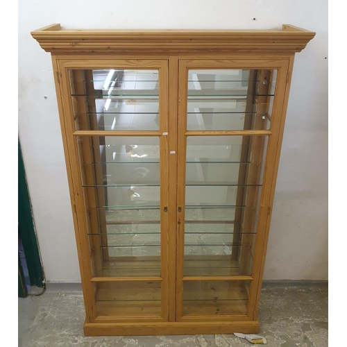 143 - Large Pine 2 Door Glazed Display Case, mirror back with sets of shelves, plinth base BWL