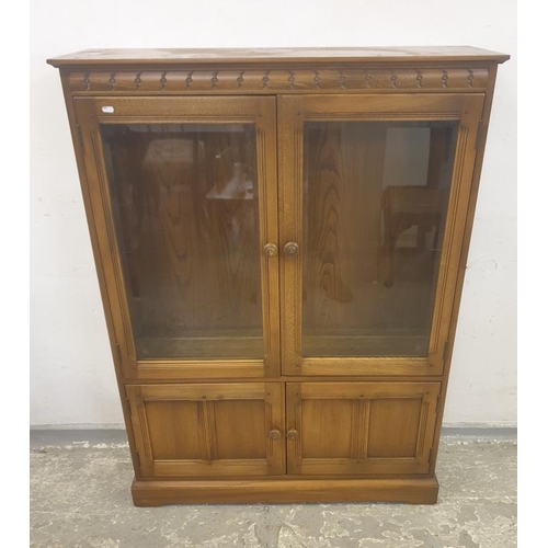 53 - Ercol Elm Side Cabinet, lower section with pair of panel doors, plinth base, pair of glazed doors ov... 