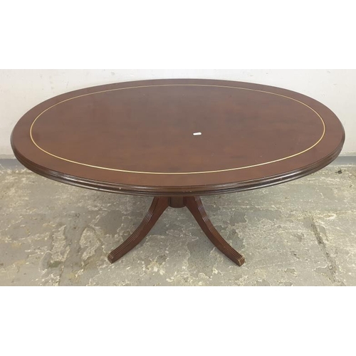 19 - Modern Oval Mahogany Effect Coffee Table, turned central column, 4 reeded sabre style supports, oval... 