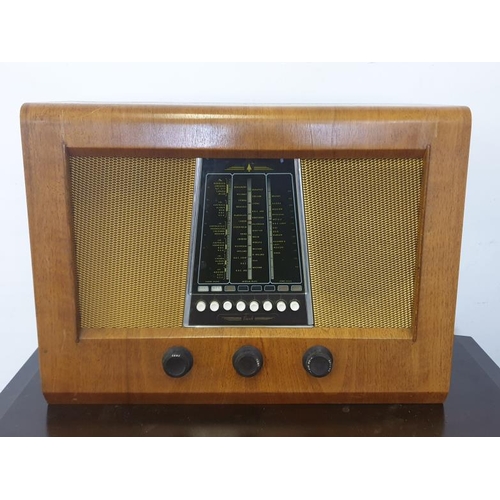 81 - Bush Walnut Table top Radio. NOT TESTED   A6/7