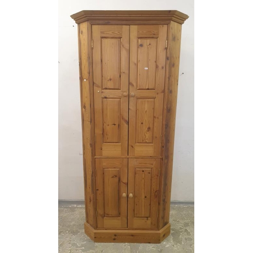 142 - Tall  Pine Corner Cupboard with 2 sets of panelled doors opening to reveal 4 internal shelves (BWR)