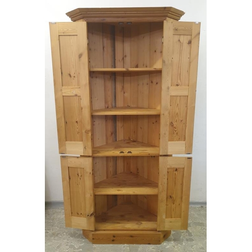 142 - Tall  Pine Corner Cupboard with 2 sets of panelled doors opening to reveal 4 internal shelves (BWR)