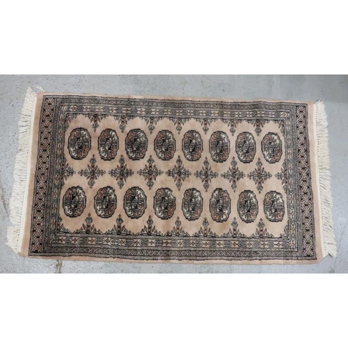 4A - Bokhara Rug, beige with oval designs approx. 138cm x 77cm (FW)