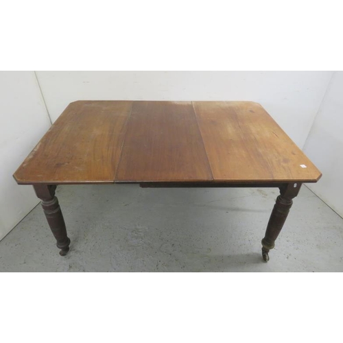 53 - Extending Wind Out Victorian Dining Table with canted corners, turned castered supports, approx. 105... 