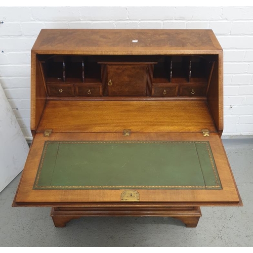 41 - Queen Anne Style Walnut Bureau the fall enclosing fitted nest, green leather writing area, 4 drawers... 