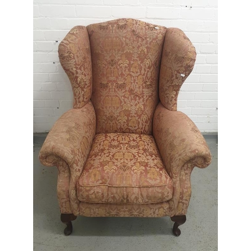 4 - 1950's Liberty's Wing Back Armchair upholstered in coral fabric with show wood cabriole supports FW