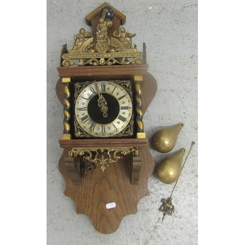 413 - Dutch Wall Clock with brass Atlas pear shaped brass weights, Roman numerals, chapter ring in oak cas... 