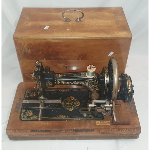 1232 - Frister & Rossmann Black Gilt Tooled Sewing Machine in wooden case