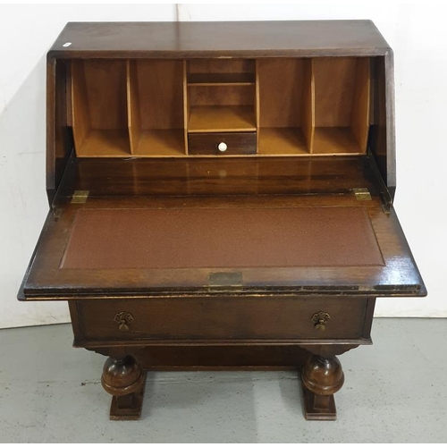 50 - Oak Art Deco Style Bureau on bold supports with brass tassel handles, 2 long drawers with fall flap ... 