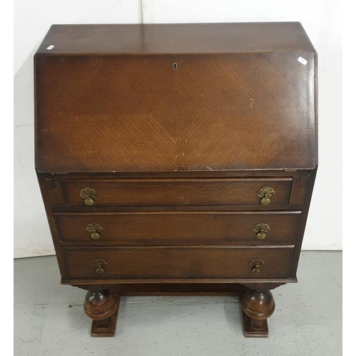 50 - Oak Art Deco Style Bureau on bold supports with brass tassel handles, 2 long drawers with fall flap ... 