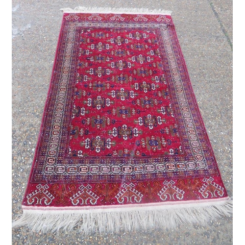 128A - Persian Style Turkman Rug with red ground, approx. 215cm x 124cm A13