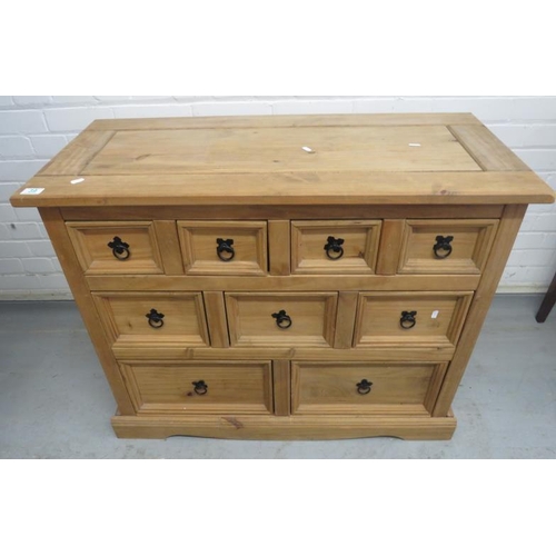 39 - Pine Merchant's Chest of 9 Drawers, 4 small, 3 medium & 2 large with ring pull handles, marked SPD01... 