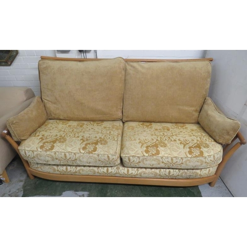 50 - Ercol Renaissance Elm Suite with inspection label no. 2635, settee, armchair & footstool with storag... 