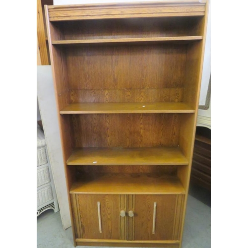 139 - Mid Century Design Oak Bookcase with 2 cupboard doors to base, open shelves over approx. 180cm H x 9... 